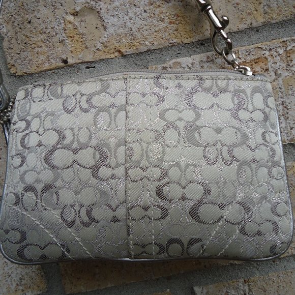 Coach wristlet with classic signature print canvas. - Picture 2 of 16